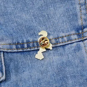 Cute gold tone flamingo brooch pin back view metal badge for denim jacket bags decor.