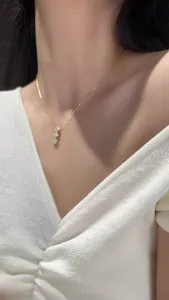 Elegant 925 silver four-leaf clover necklace for women, delicate gold clavicle chain jewelry.