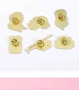 Detailed view of the reverse side showing secure metal clutch backs of the cute medical enamel pins.