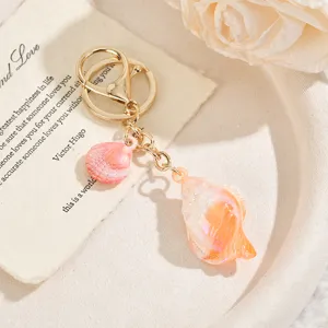 Porte-clés coquillage conque océan rose dégradé métal plaqué or acrylique sac breloque