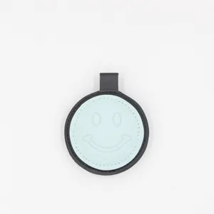 Cute leather smiley face keychain bag charm stylish round pendant accessories for car keys.