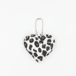 Close-up detail shot of the fluffy leopard print heart keychain pendant with metal chain.
