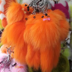 Fluffy orange fox pom-pom keychain, cute plush animal bag charm with metal keyring and cute bow.
