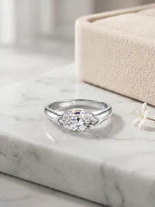 Stunning 1CT marquise cut moissanite ring crafted in 925 silver, sleek solid band detail.