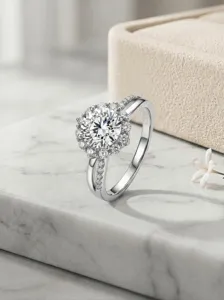 Close-up of 925 sterling silver flower cluster moissanite ring with split pave band.