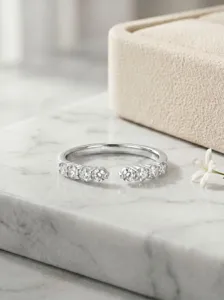 Detailed view of the 925 sterling silver open ring featuring sparkling moissanite stones.