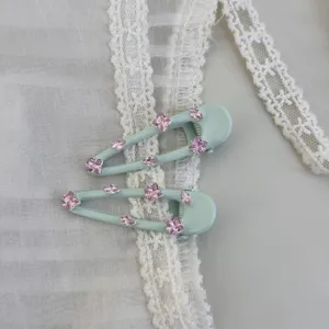 Mintgrüne Strass-Haarspange, elegante Seiten-Ponyklammer mit pinken Kristall-Details.