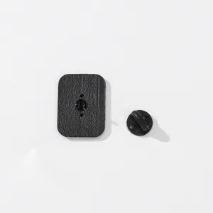Detail view showing the back pin and rubber clutch of the creative alloy brooch badge.