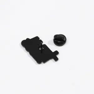 Detailed back view of the black enamel pin brooch showing the secure metal pin and rubber clutch.