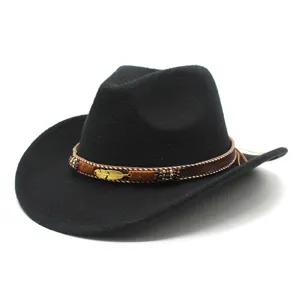 Close-up detail of black wool felt western cowboy hat with metal feather and beaded band.
