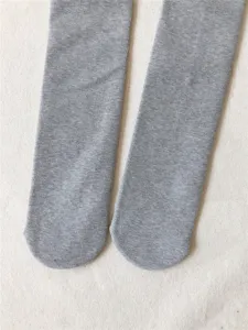 Grey ribbed thermal fleece tights detail, soft cotton texture for autumn winter daily wear.