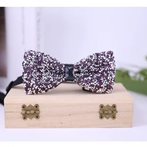 Sparkling crystal bow tie detail, purple and silver rhinestone wedding groom accessory, elegant design.