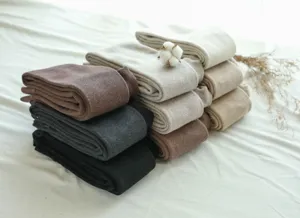 Winter warm fleece lined vertical striped tights detail shot, soft thick cashmere feel leggings.