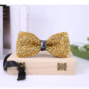 Crystal bow tie detail view, gold rhinestone bowknot for wedding groom suit, sparkling men shirt.
