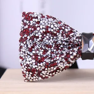 Sparkling crystal rhinestone bow tie detail, elegant men's fashion accessory for weddings.