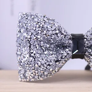 Sparkling silver crystal rhinestone bow tie detail close-up for formal wedding wear events
