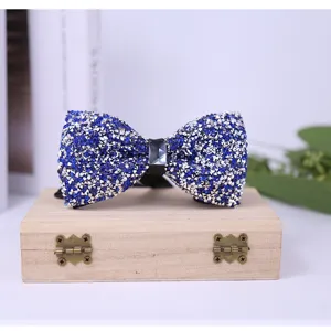 Blue crystal rhinestone bow tie close-up, elegant shiny wedding groom formal neckwear detail