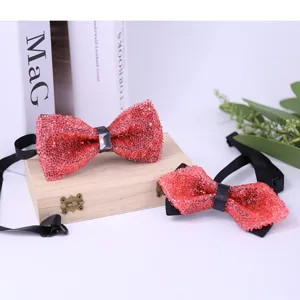 Detailed view of red crystal sequin bow tie for men wedding groom groomsmen fashion accessory.