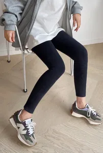 Black ribbed fleece-lined cropped tights for women, thermal compression slimming leggings.