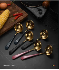 Stainless steel hot pot soup spoon and colander set with elegant gold bowl and handles.