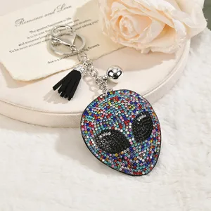 Glitterende strass alien sleutelhanger tasbedel met stijlvolle zwarte kwast.