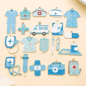 Close up of blue medical enamel charms details, assorted DIY jewelry accessories pendants.
