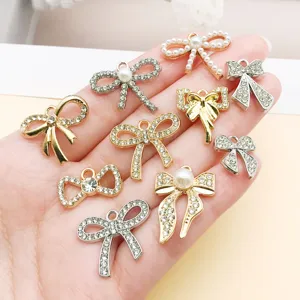 Hollow rhinestone bow zinc alloy pendant charms for DIY jewelry bracelet necklace making accessories.