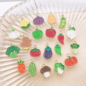 Close-up detail of assorted vegetable enamel zinc alloy DIY charms and pendants for jewelry making.