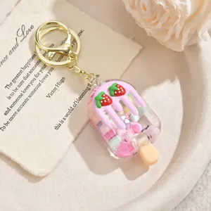 Cute strawberry ice cream quicksand keychain, clear resin bag charm for girls and gifts.