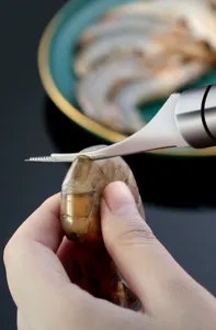 Strumento per pulire e sfilettare i gamberi in acciaio inossidabile per frutti di mare.