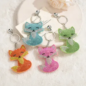 Cute rhinestone fox keychain, sparkly crystal animal bag charm and car key ring accessory.