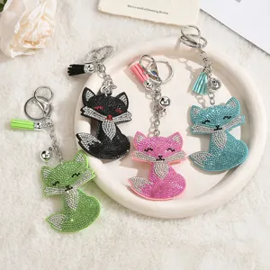Cute rhinestone fox keychain with tassel charm sparkling crystal key ring for women bags.