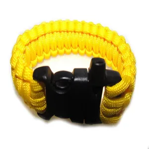 Outdoor survival paracord bracelet with whistle buckle, durable nylon survival gear for camping.