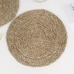 Round natural seagrass woven placemat heat insulated table mat rustic kitchen decor item.