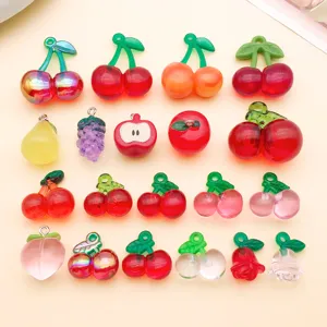 Miniature acrylic fruit charms featuring cherries, grapes, apples, and peaches for DIY jewelry making.
