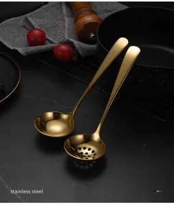 Gold stainless steel soup spoon and colander set for kitchen hot pot cooking dining use.
