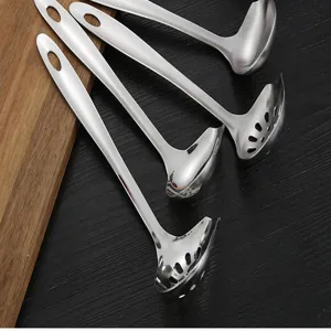 Stainless steel slotted spoon soup ladle set, long handle kitchen cooking tool detail view.