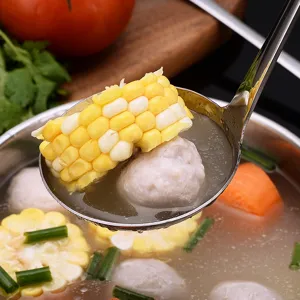 Stainless steel soup ladle with long handle, durable kitchen tool for hot pot and home cooking.
