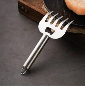 Stainless steel meat shredder detail view, bear claw fork for kitchen BBQ and pulled pork prep.