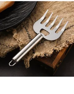 Stainless steel meat shredder claw detail view, perfect for kitchen barbecue and pulled pork.