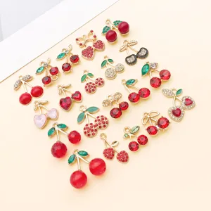 Detailed view of luxury rhinestone cherry alloy charms, perfect for DIY jewelry making.