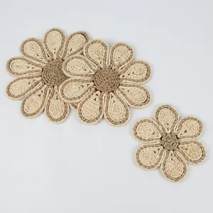 Handmade natural straw woven flower shaped placemat and coaster set, bohemian table decor.