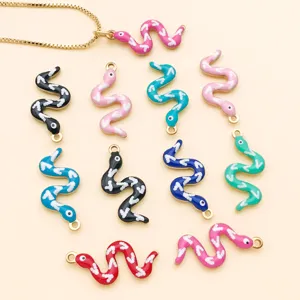 Colorful enamel snake pendants set, stainless steel gold plated DIY jewelry charms detail.
