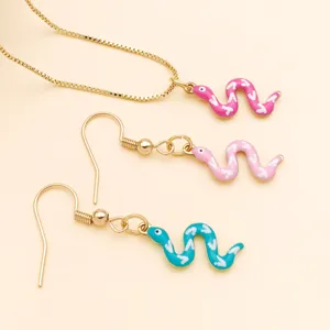 Gold necklace and earrings set featuring cute colorful enamel snake pendants details.