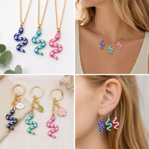 Detailed view of colorful enamel S-shaped snake pendants featuring necklaces, keychains and earrings.