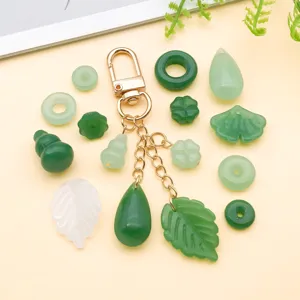 Kit de accesorios de llavero de vidrio verde DIY para pulseras hechas a mano y joyería artesanal.