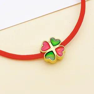 Accessorio per gioielli DIY bordo dorato trifoglio quattro foglie ciondolo cuore goccia