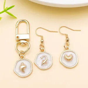 Porte-clés et boucles d'oreilles en alliage nacré série océan, détail de bijoux DIY