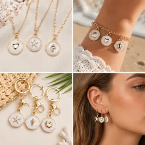 Composants de bijoux en alliage de la série océan avec pendentifs blancs nacrés comme des étoiles.