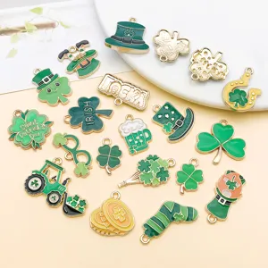 Mixed 20 styles green St. Patrick's Day enamel clover hat charms for DIY jewelry making.